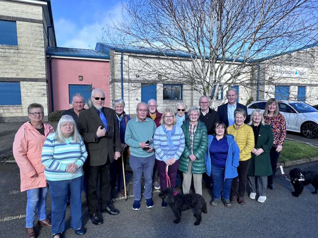 Trustee Roy Douglas with members of the Ballymena Club for the Hard of Hearing pictured with the Club’s new portable loop system, purchased using funding committed by The Gallaher Trust.